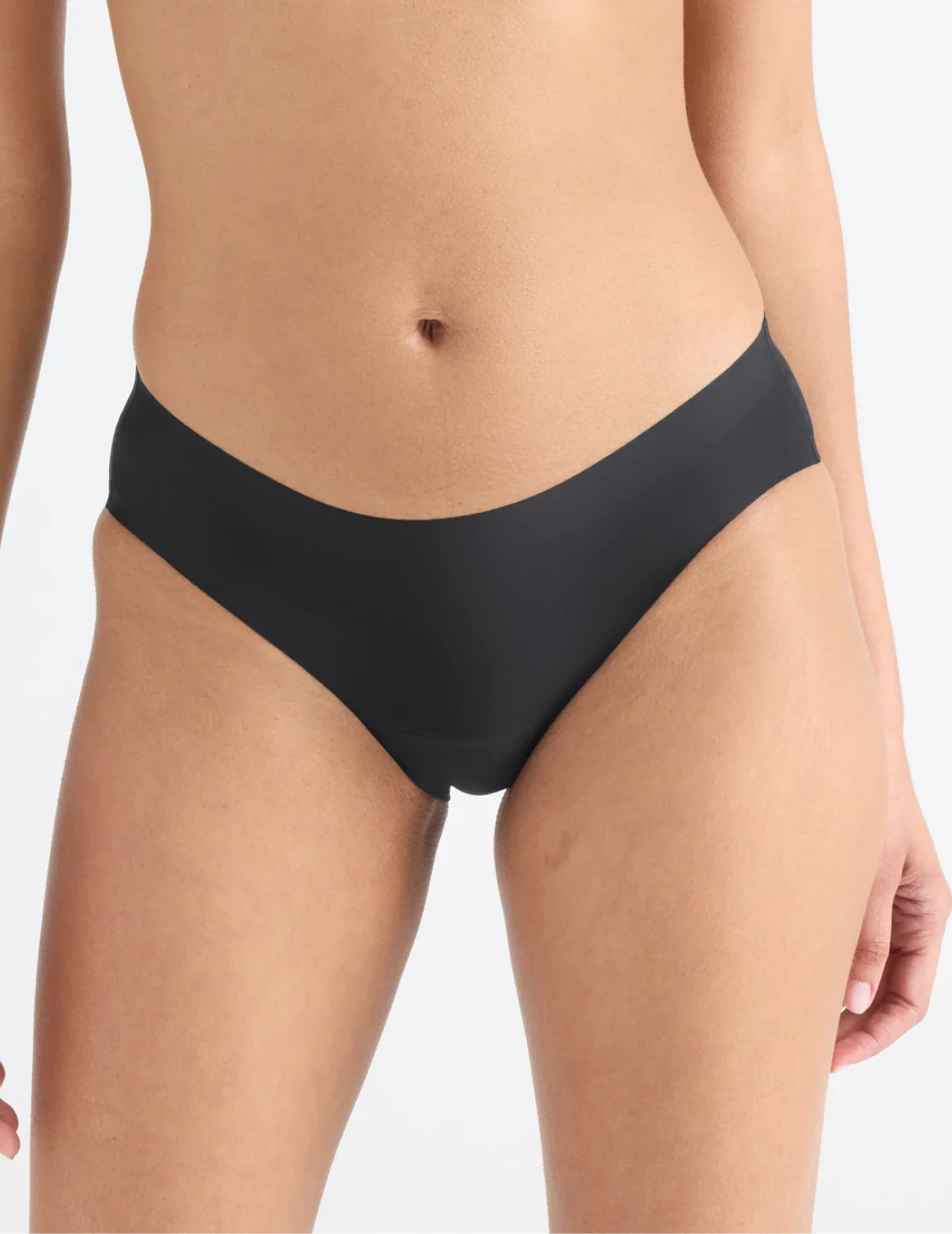 Front view of model wearing the Leakproof UltraThin No-Show Bikini highlighting the coverage and smooth fit – Black – view 4 of 47