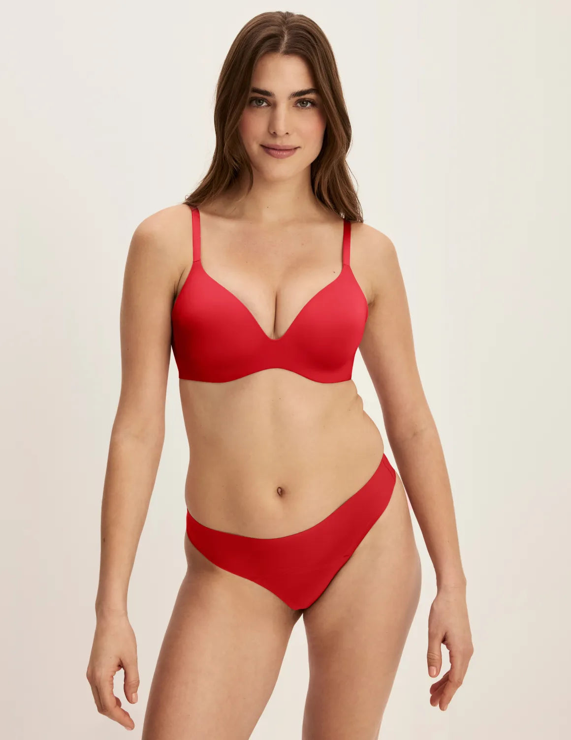 Full-body view of model wearing the Light Leakproof UltraThin No-Show Thong highlighting the coverage and smooth fit – Shimmer Cherry – view 8 of 40