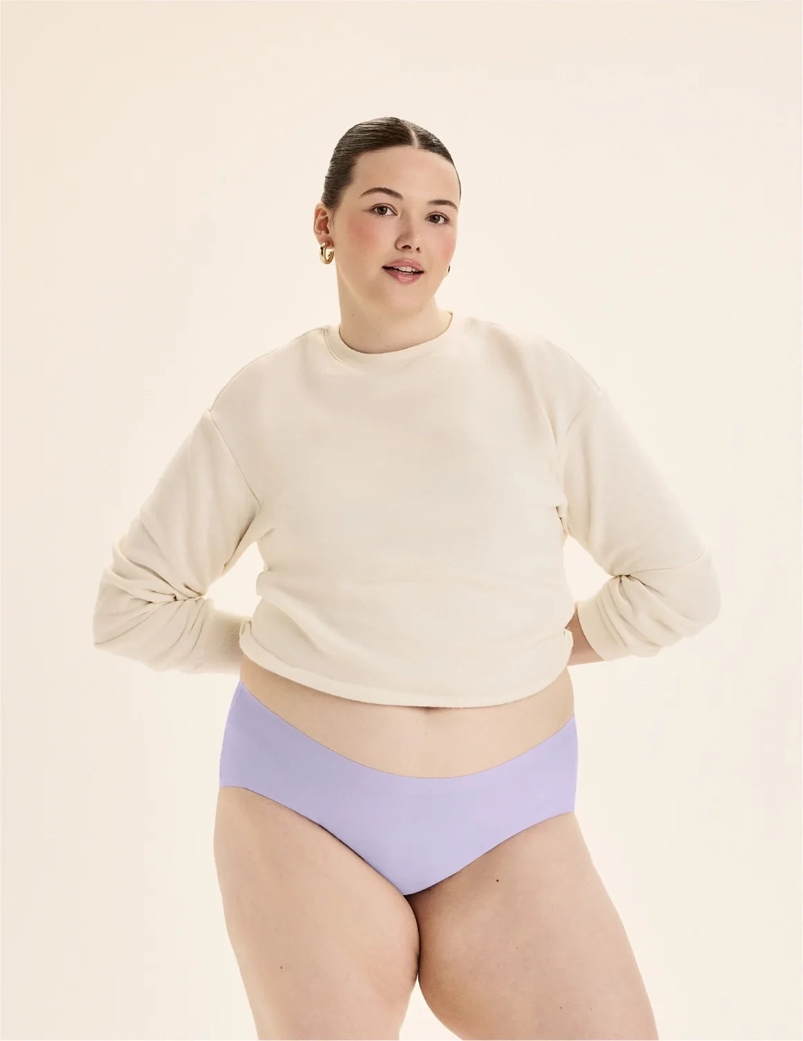 Front view of model wearing the Teen Leakproof UltraThin No-Show Boyshort highlighting the coverage and smooth fit – Ultra Violet – view 8 of 74