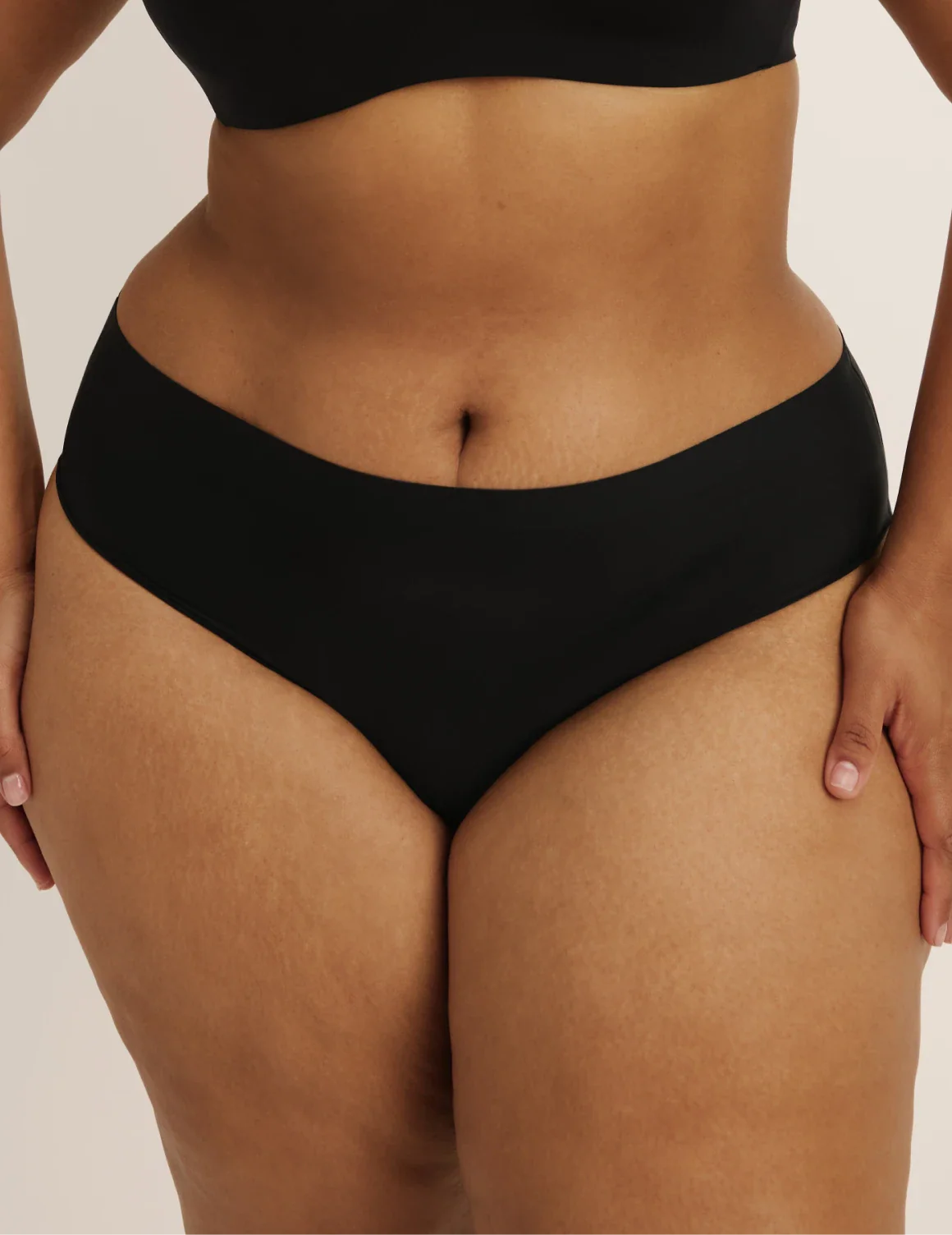 Front view of model wearing the Light Leakproof No-Show French Cut highlighting the coverage and smooth fit – Black – view 1 of 8