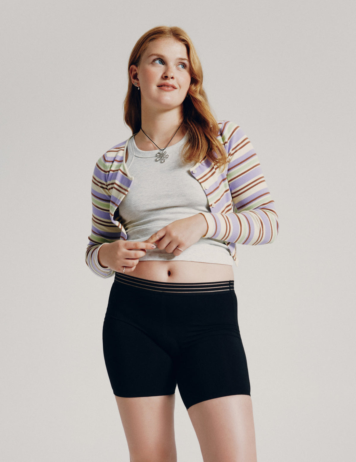 Front view of model wearing the Teen Leakproof Luxe Modal Sleep Boxer highlighting the coverage and smooth fit – Black – view 1 of 8