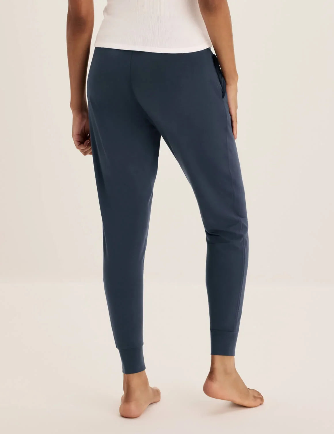 Back view of model wearing the Modal Jogger highlighting the coverage and fit – Twilight Navy – view 11 of 17