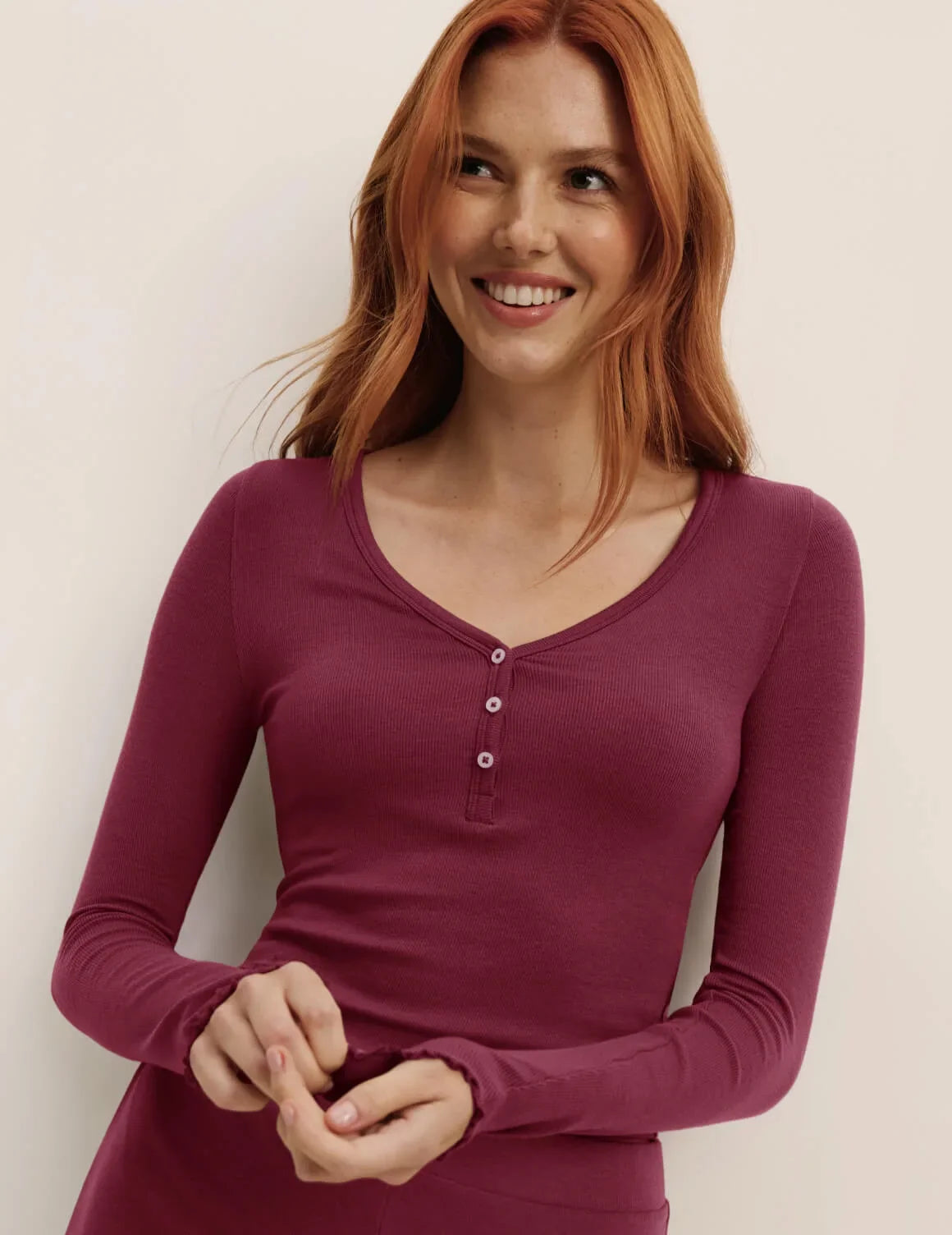 Front view of model wearing the Modal Rib Long Sleeve Henley highlighting the coverage and fit – Dark Cherry – view 8 of 17