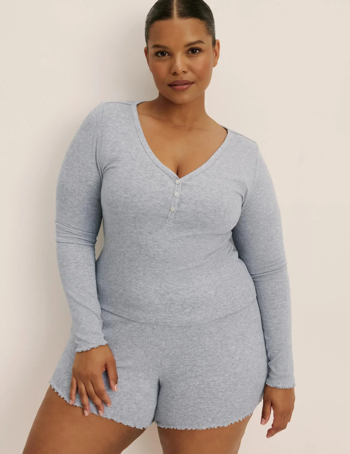 Front view of model wearing the Modal Rib Long Sleeve Henley highlighting the coverage and fit – Heathered Grey – view 4 of 17