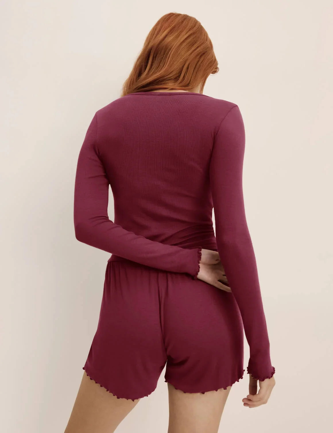 Back view of model wearing the Modal Rib Short highlighting the coverage and fit – Dark Cherry – view 7 of 16