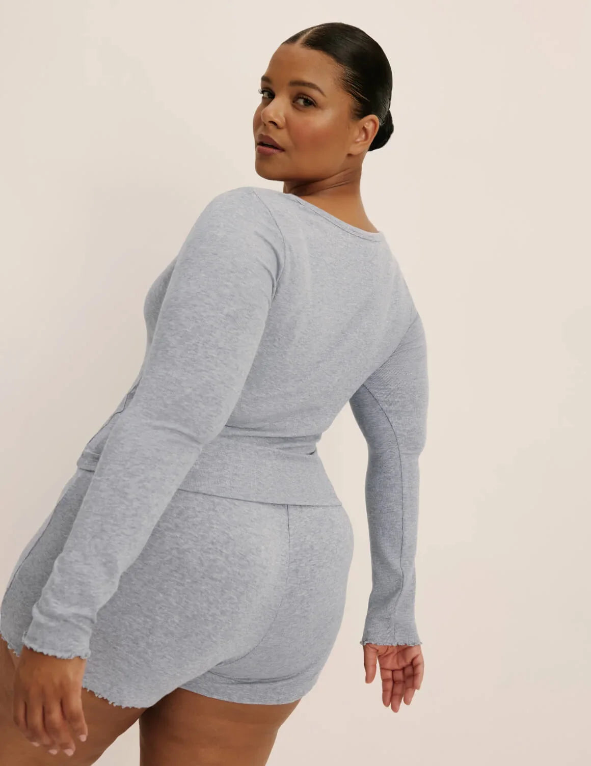 Back view of model wearing the Modal Rib Short highlighting the coverage and fit – Heathered Grey – view 4 of 16