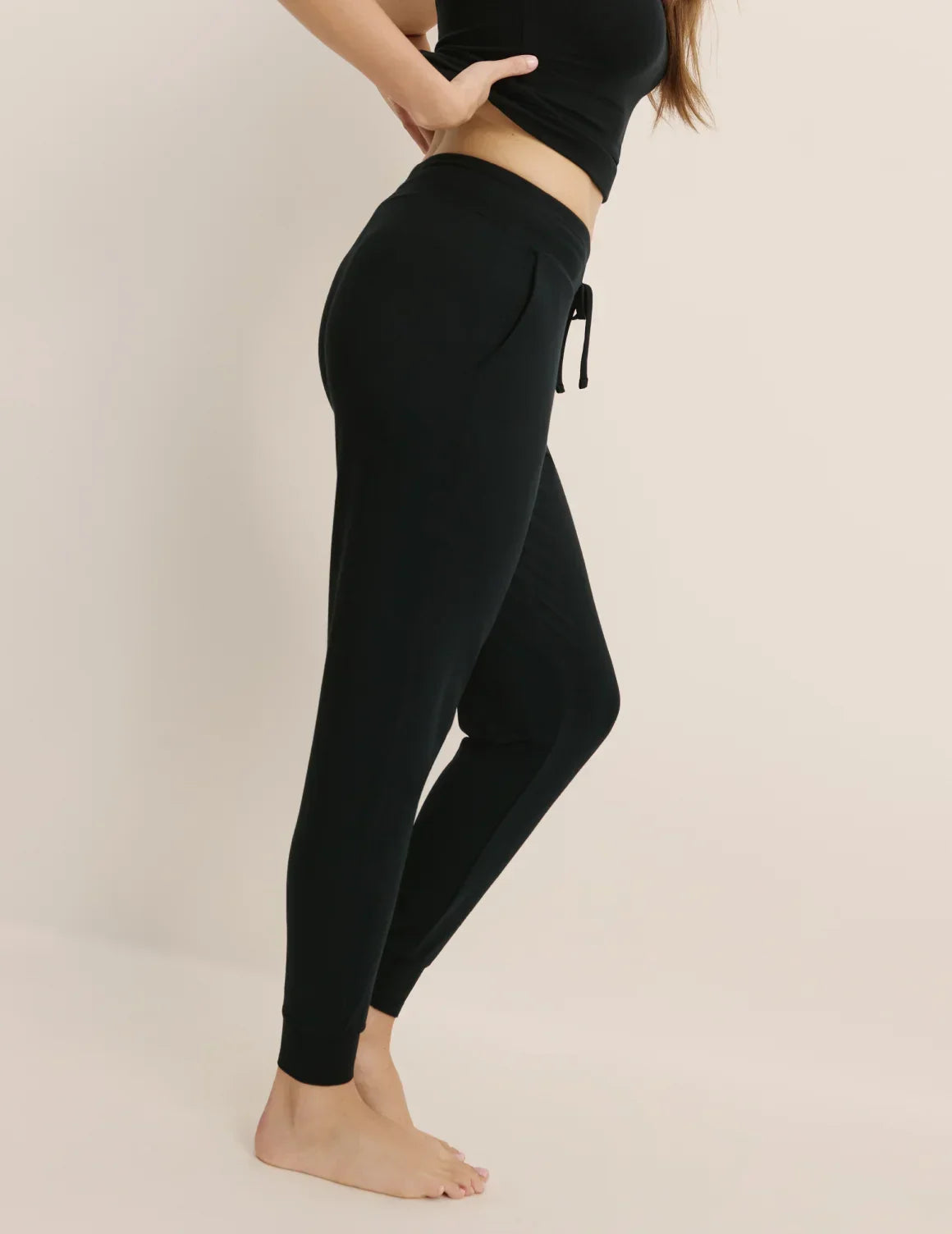 Side view of model wearing the Modal Jogger highlighting the coverage and fit – Black – view 5 of 17