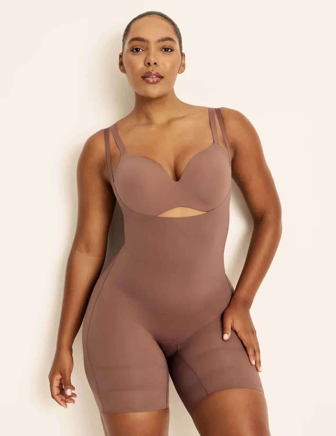 Front view of model wearing the Customizable Open Bust Shaper Bodysuit highlighting the coverage and smooth fit – Sola – view 2 of 19