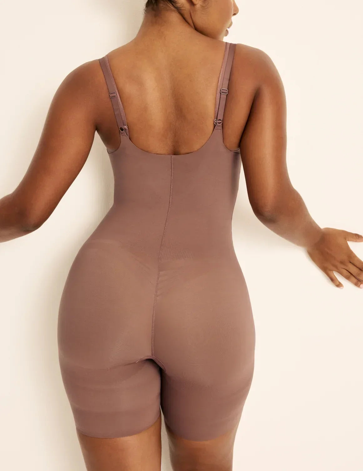 Back view of model wearing the Customizable Open Bust Shaper Bodysuit highlighting the coverage and smooth fit – Sola – view 8 of 19