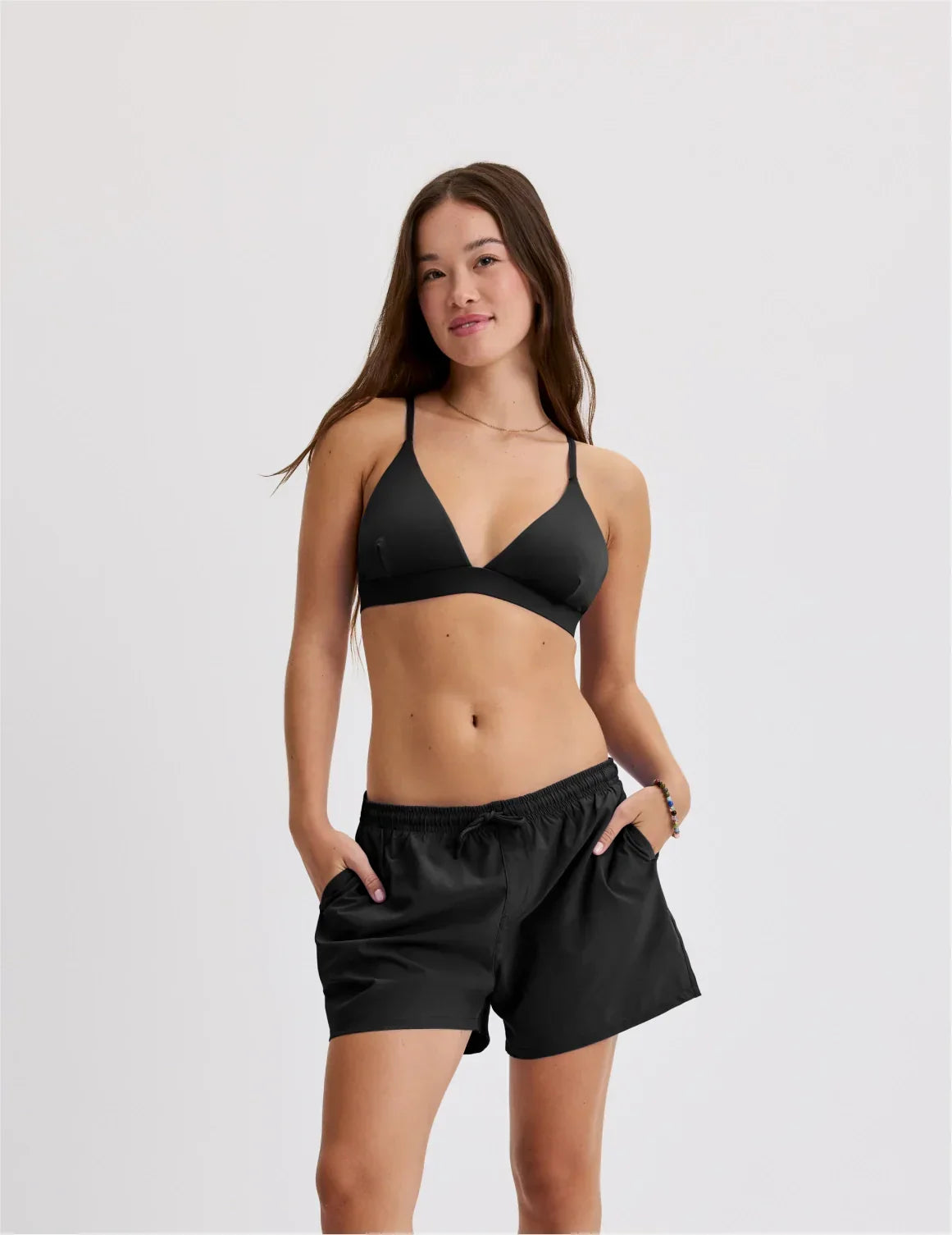 Front view of model wearing the Teen Period Swim Board Shorts highlighting the coverage and fit – Black – view 1 of 42