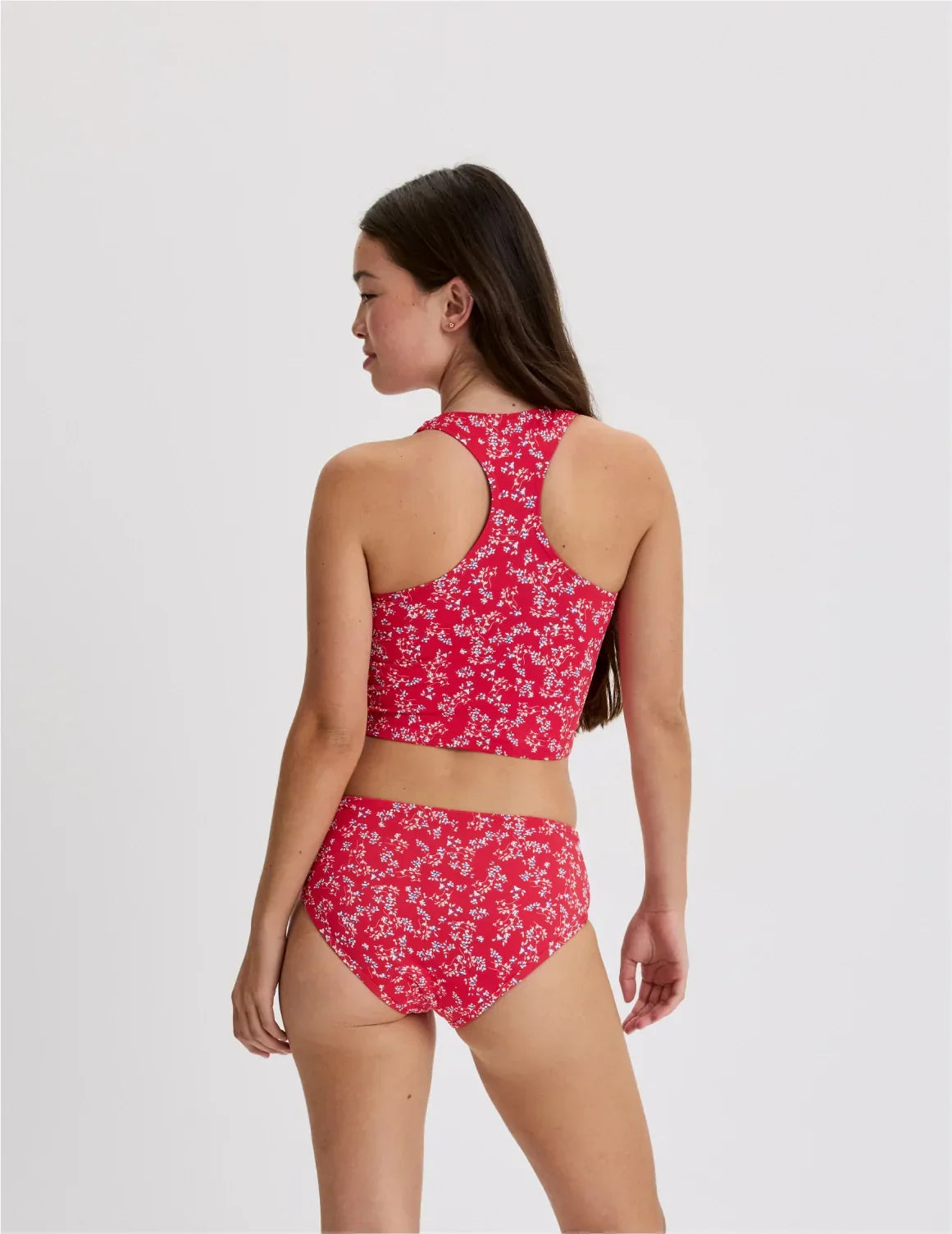 Back view of model wearing the Teen Racerback Tankini Swim Top highlighting the coverage and fit – Poppy Petal – view 8 of 45
