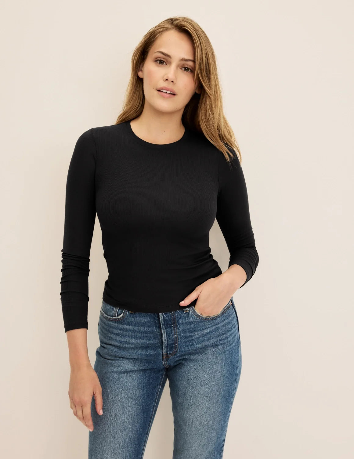 Front view of model wearing the Modal Rib Long Sleeve highlighting the coverage and fit – Black – view 1 of 21