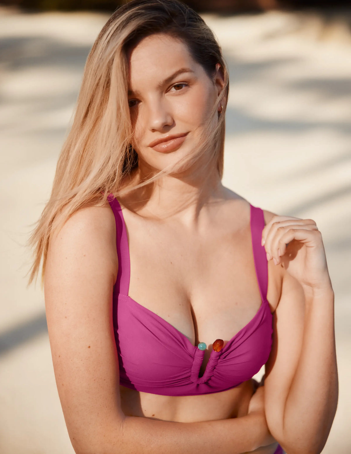Front view of model wearing the Limited-Edition Sculpt Ruched Bikini Top, highlighting the neckline, strap design, and silhouette – Deep Orchid – view 6 of 13