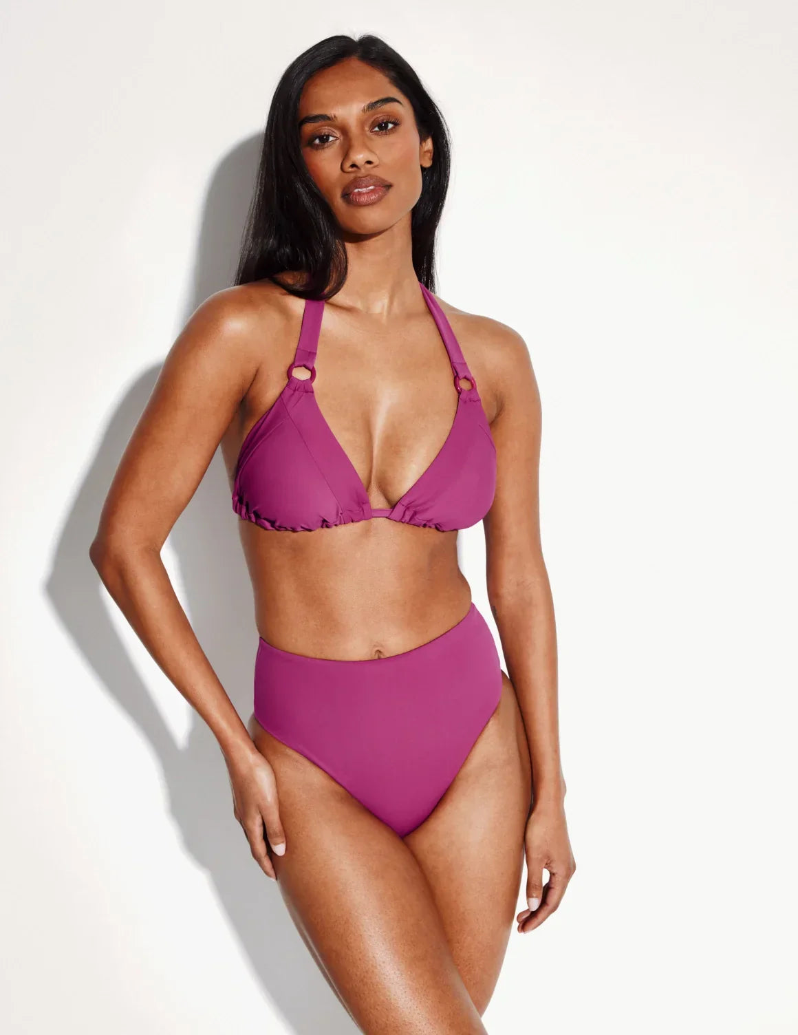 Front view of model wearing the Sculpt High Rise Bikini Swim Bottom highlighting the coverage and fit – Deep Orchid – view 2 of 36