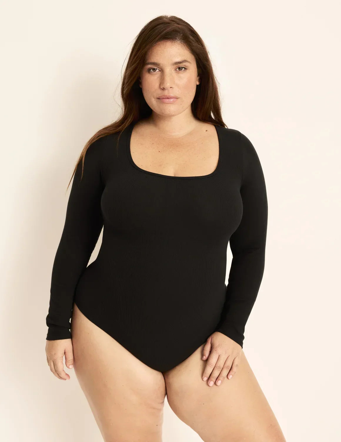 Front view of model wearing the SculptRib™ Cotton Bodysuit highlighting the neckline, fabric and hugging fit – Black – view 5 of 13
