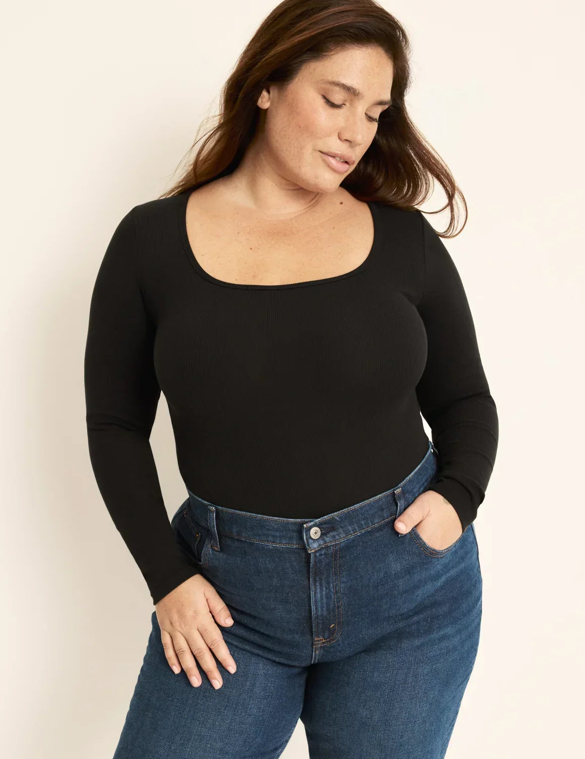 Front view of model wearing the SculptRib™ Cotton Bodysuit highlighting the neckline, fabric and hugging fit – Black – view 1 of 13