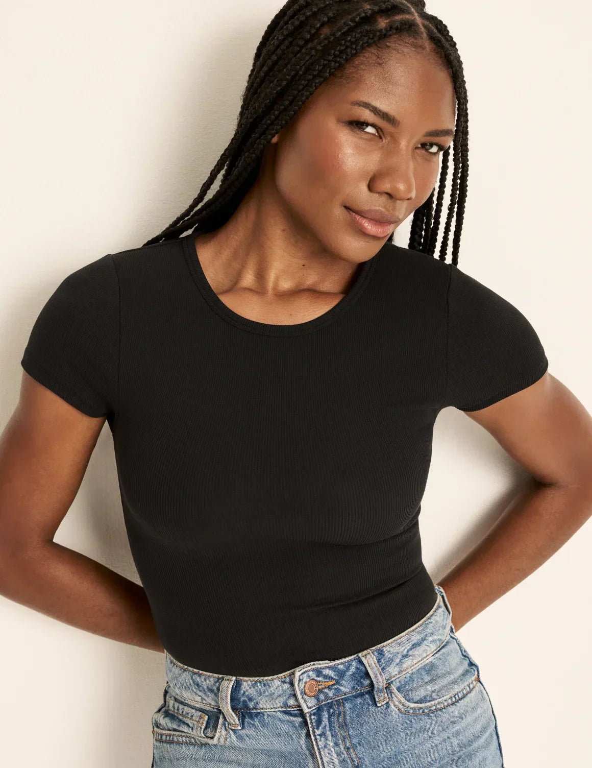 Front view of model wearing the SculptRib™ Cotton T-Shirt highlighting the neckline, fabric and hugging fit – Black – view 1 of 19