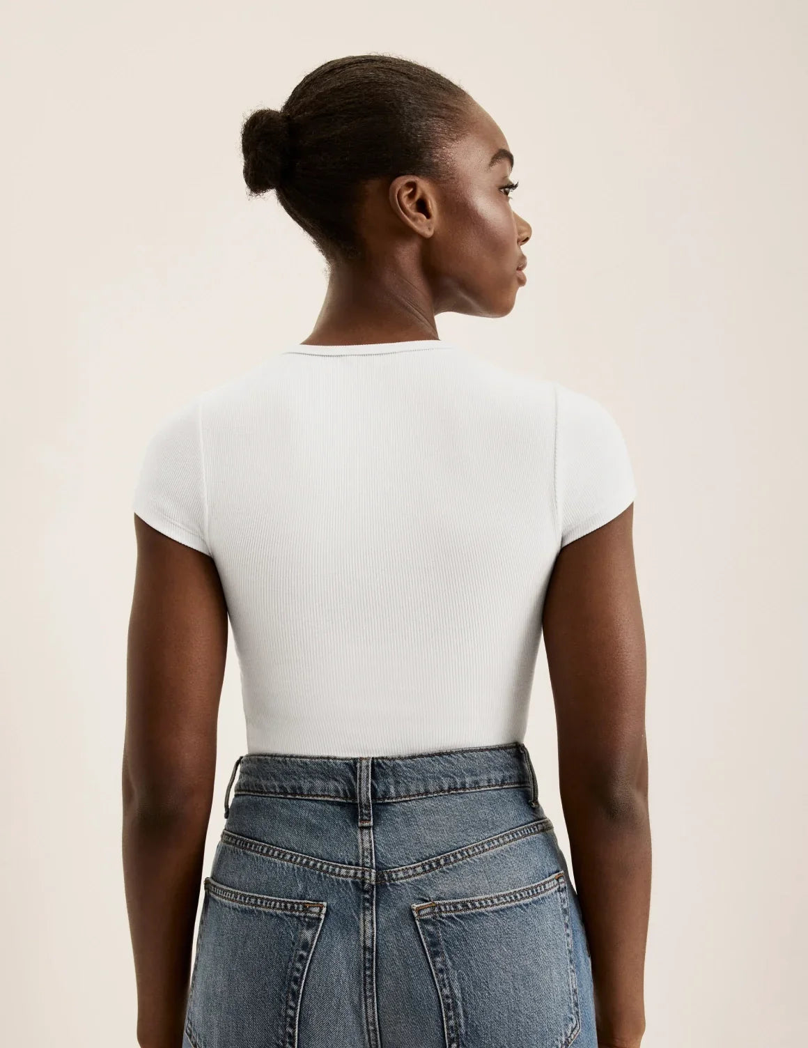 Back view of model wearing the SculptRib™ Cotton T-Shirt highlighting the neckline, fabric and hugging fit – White – view 11 of 19