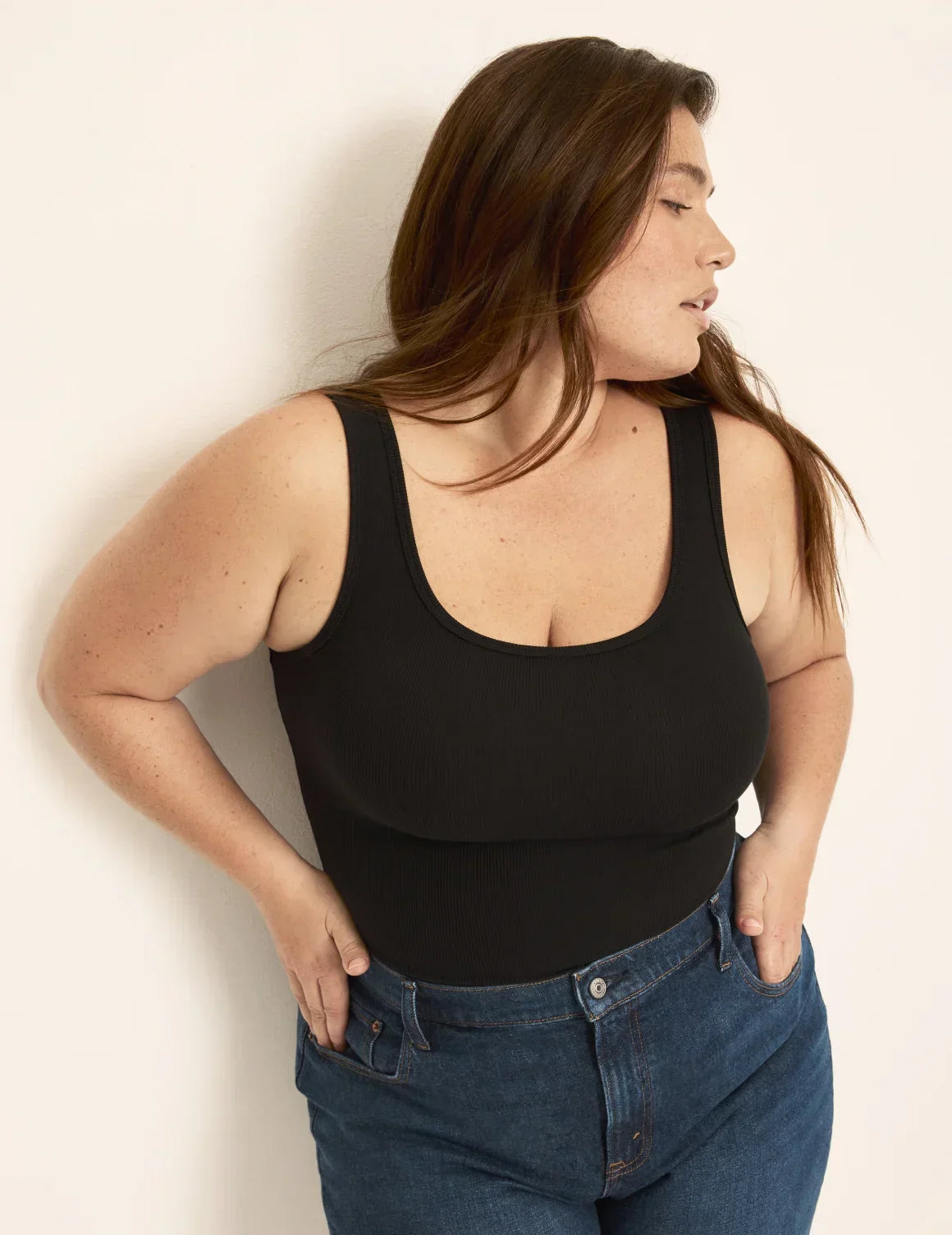 Front view of model wearing the SculptRib™ Cotton Tank highlighting the neckline, fabric and hugging fit – Black – view 6 of 44