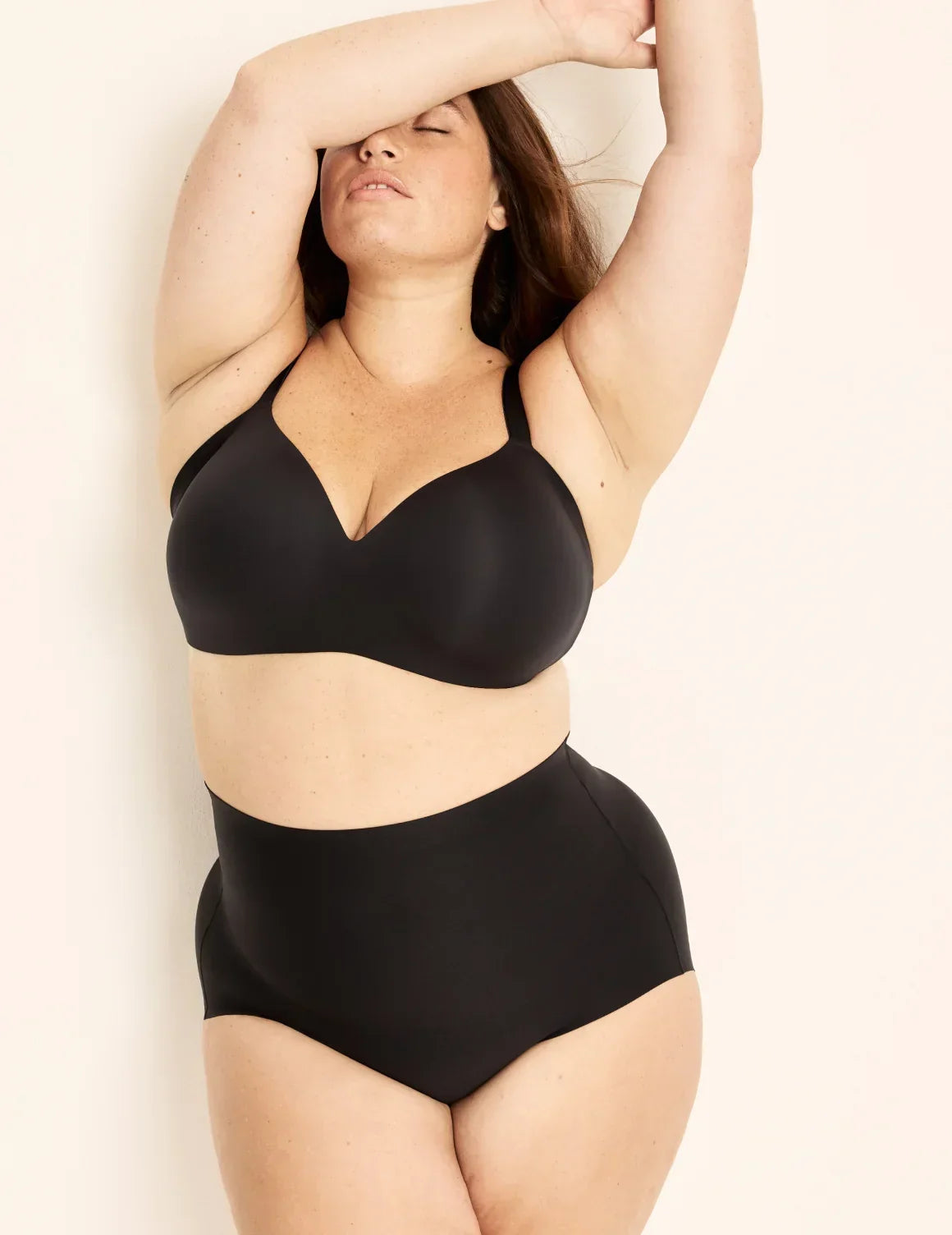 Front view of model wearing the Shaper High Rise Leakproof Briefs, highlighting the coverage and smooth fit – Black – view 2 of 17