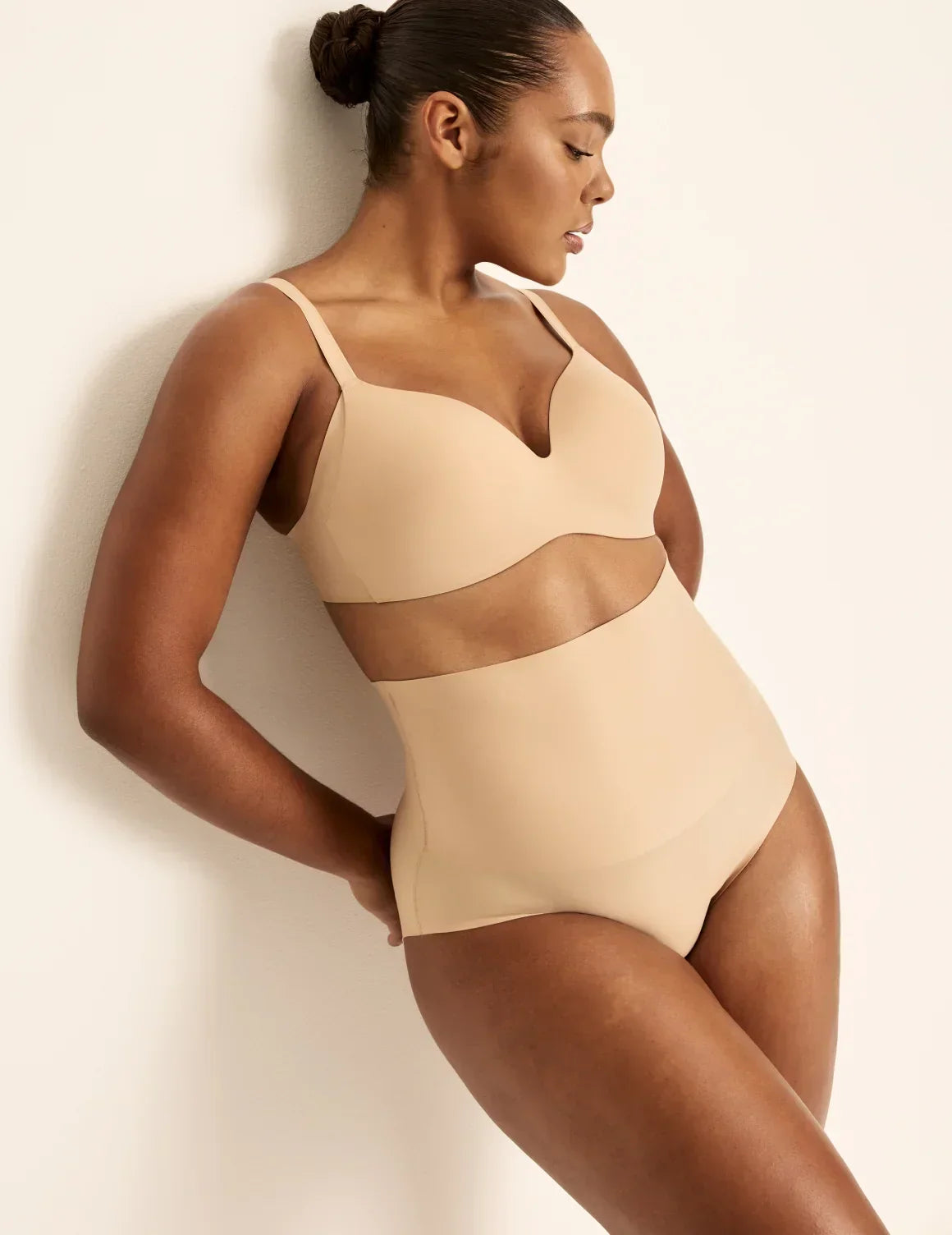 Front view of model wearing the Shaper High Rise Leakproof Briefs, highlighting the coverage and smooth fit – Warm Sand – view 1 of 17