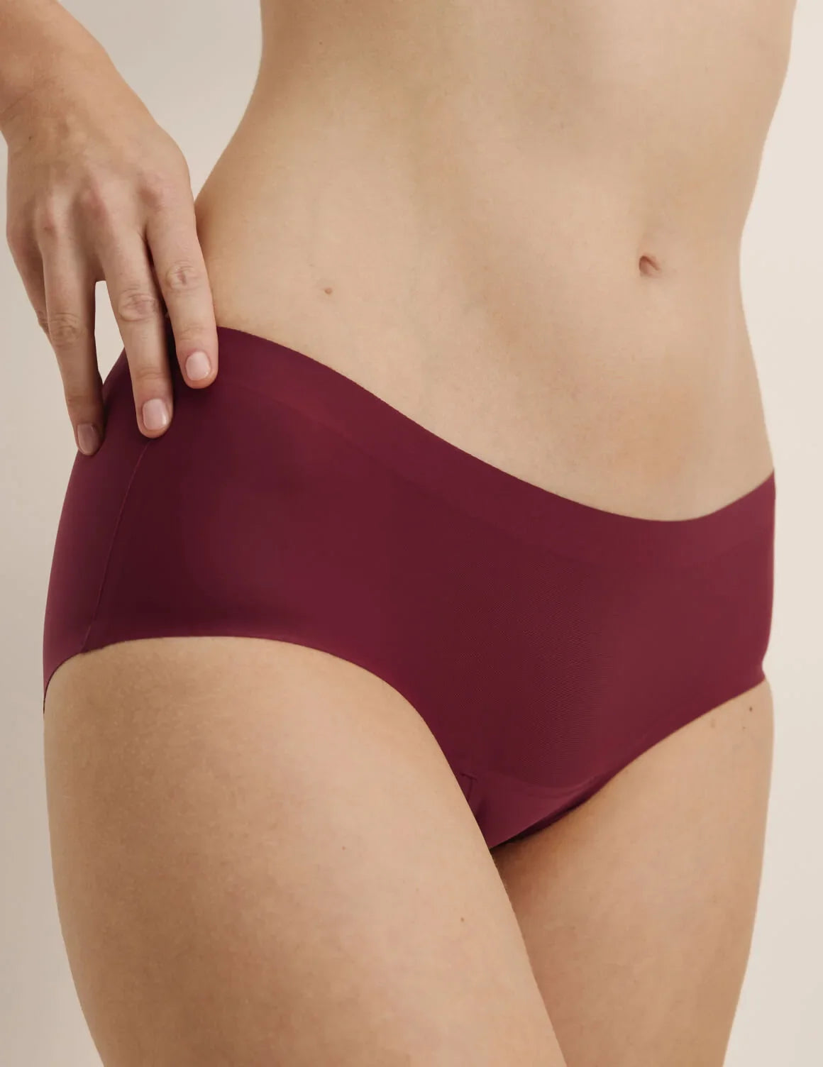 Front view of model wearing the Super Leakproof® No-Show Boyshort highlighting the coverage and smooth fit – Dark Cherry – view 10 of 28
