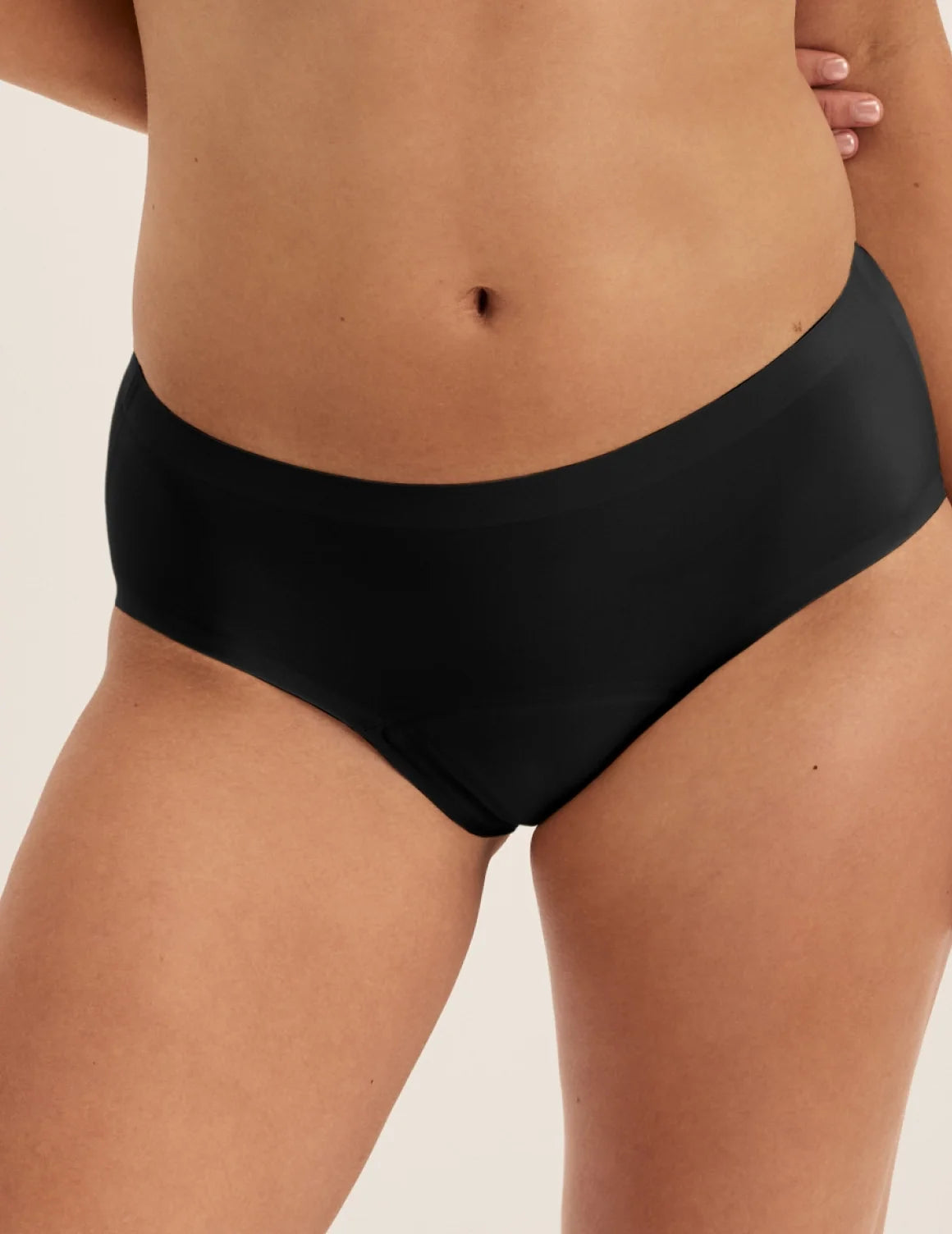 Front view of model wearing the Super Leakproof® No-Show Boyshort highlighting the coverage and smooth fit – Black – view 1 of 28