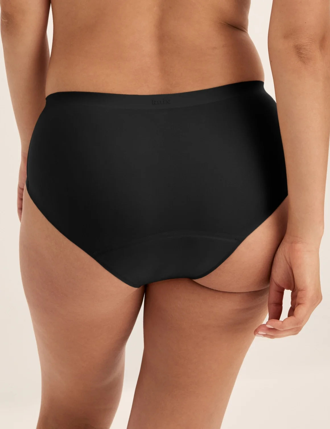 Back view of model wearing the Super Leakproof® No-Show Boyshort highlighting the coverage and smooth fit – Black – view 3 of 28