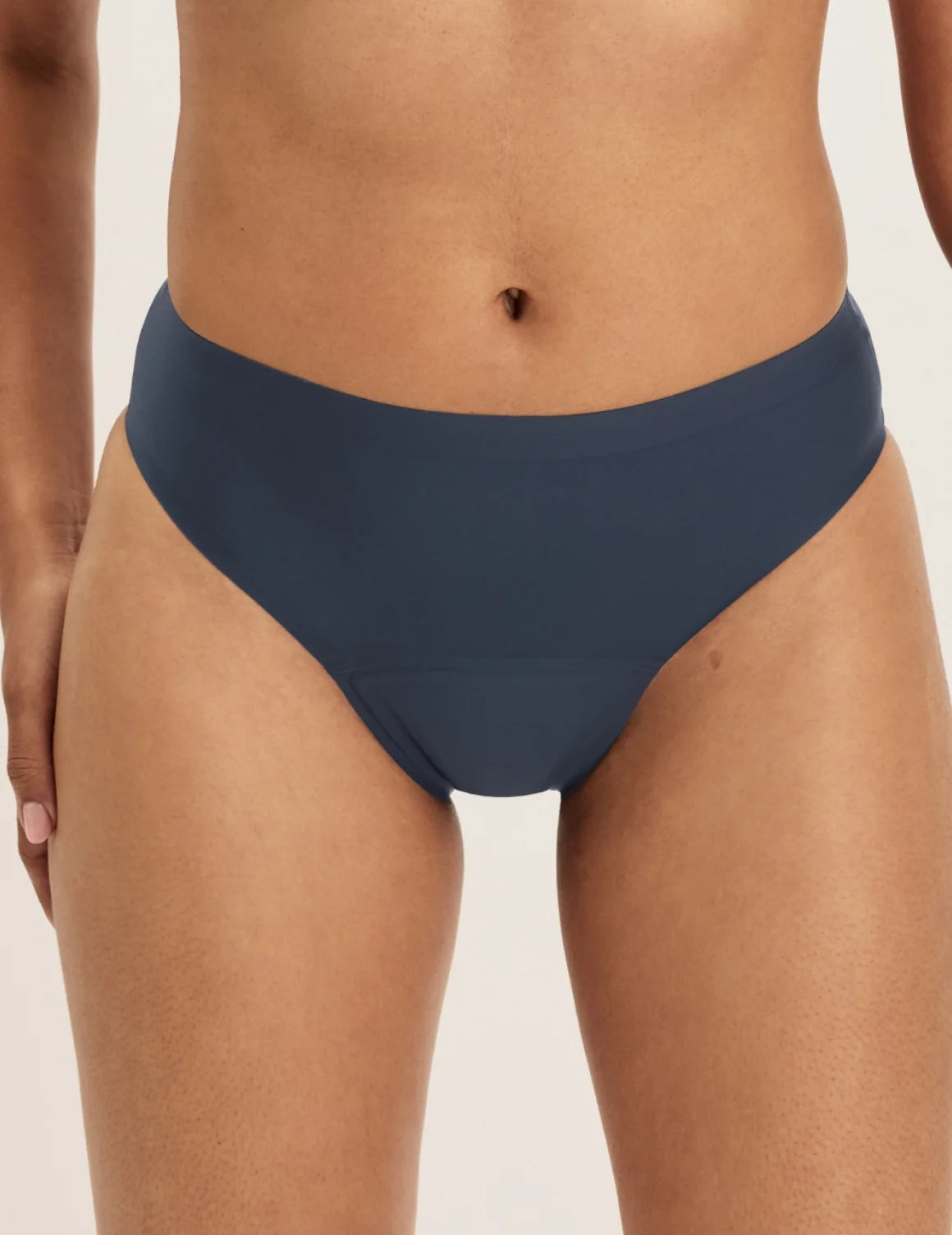Front view of model wearing the Leakproof UltraThin No-Show Bikini highlighting the coverage and smooth fit – Twilight Navy – view 4 of 27