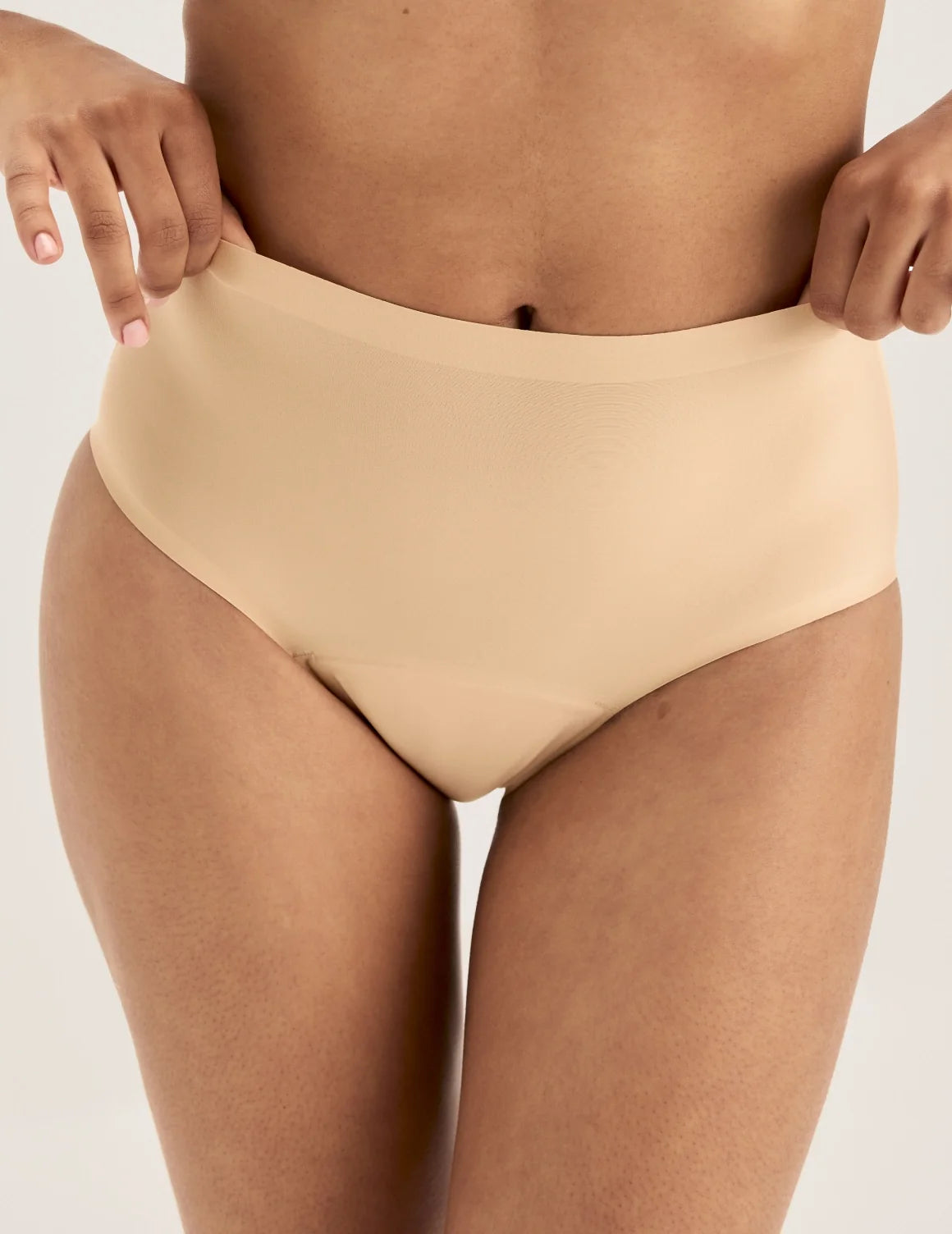Front view of model wearing the Super Leakproof® No-Show High Rise highlighting the coverage and smooth fit – Warm Sand – view 7 of 27