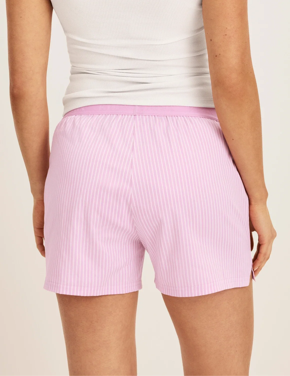Back view of model wearing the Super Leakproof® Dream Boxer™ highlighting the coverage and fit – Pink Stripe – view 5 of 63