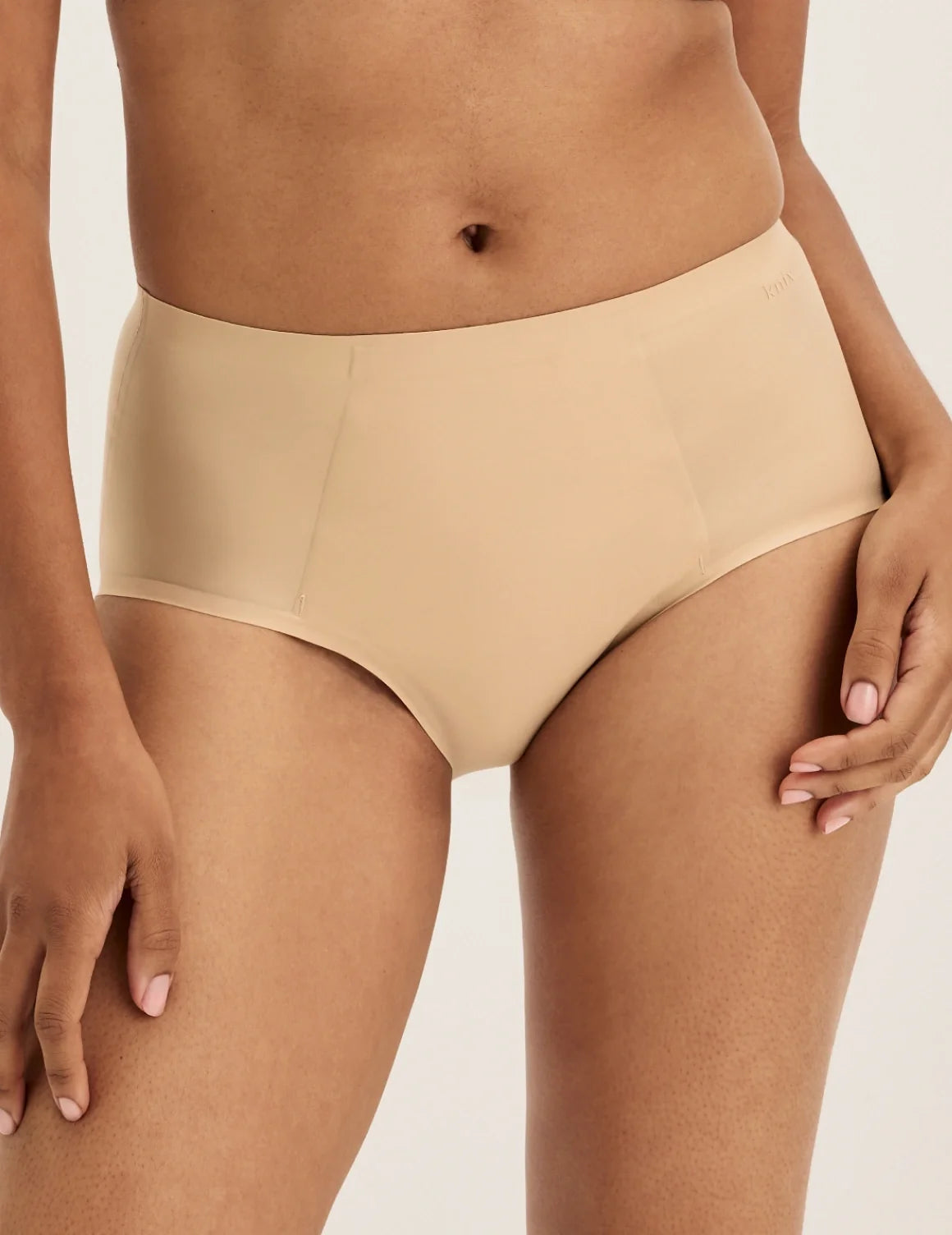 Front view of model wearing the SuperPlus Leakproof® No-Show Boybrief highlighting the coverage and smooth fit – Warm Sand – view 10 of 17