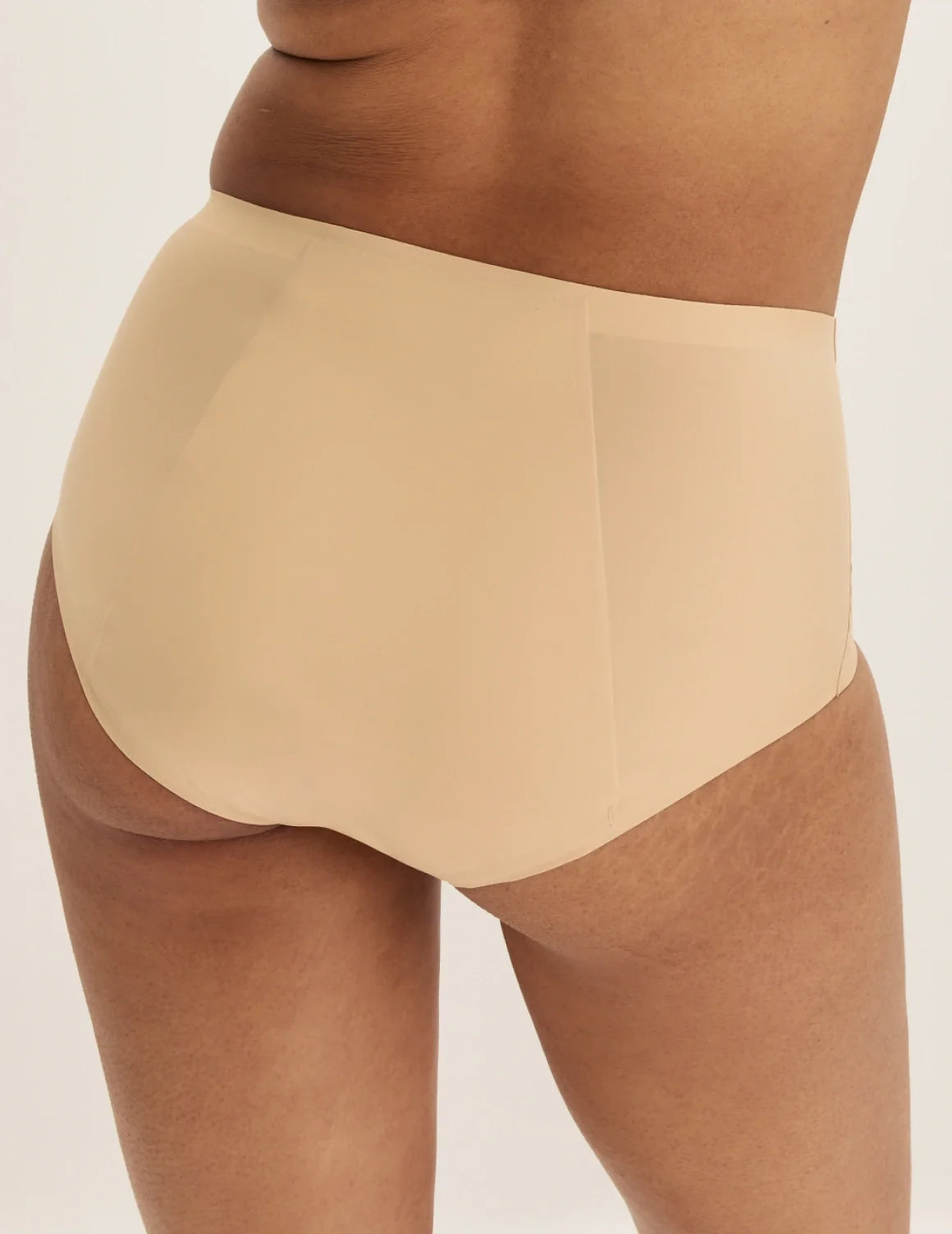Back view of model wearing the SuperPlus Leakproof® No-Show Boybrief highlighting the coverage and smooth fit – Warm Sand – view 12 of 17