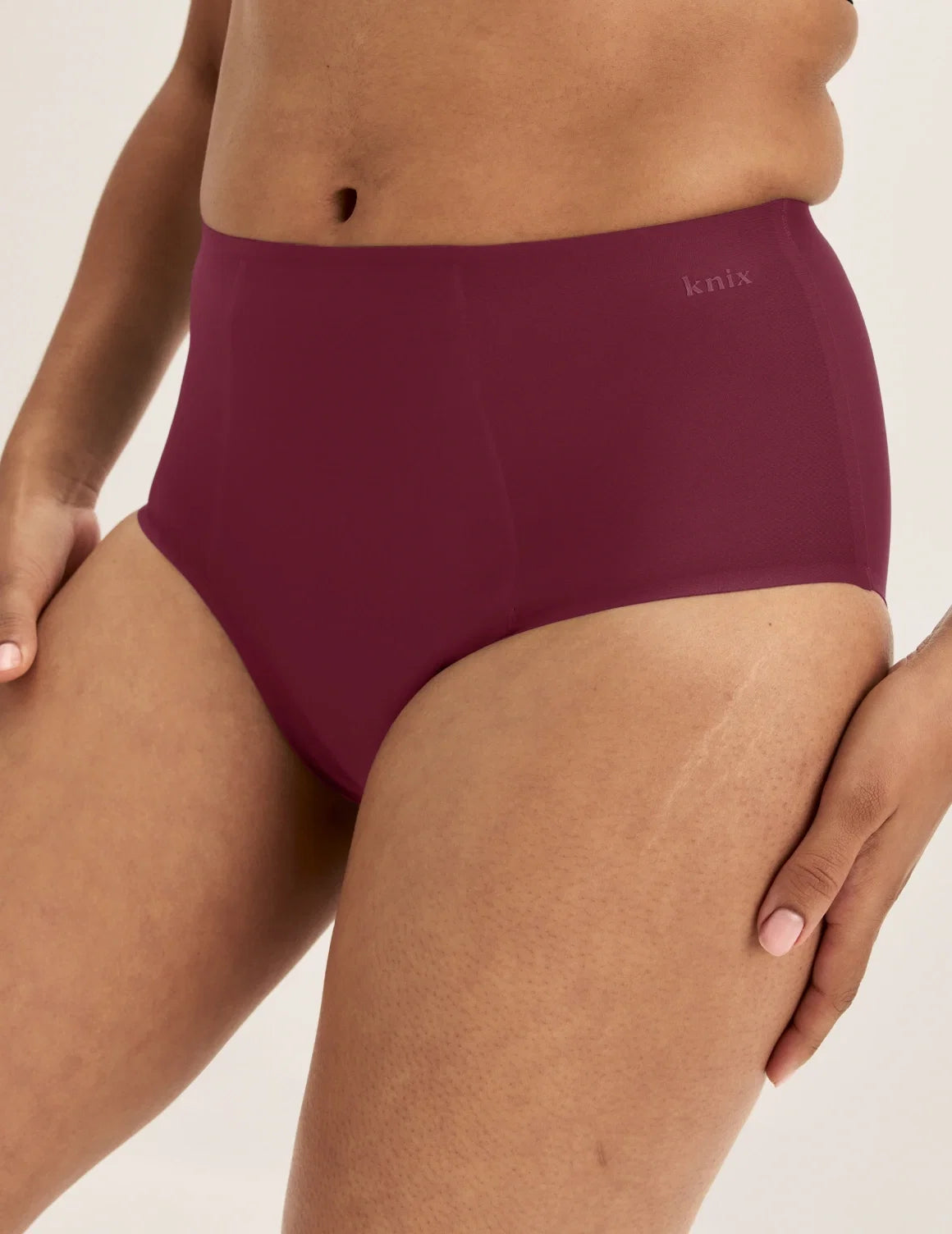 Front view of model wearing the SuperPlus Leakproof® No-Show High Rise highlighting the coverage and smooth fit – Dark Cherry – view 4 of 21