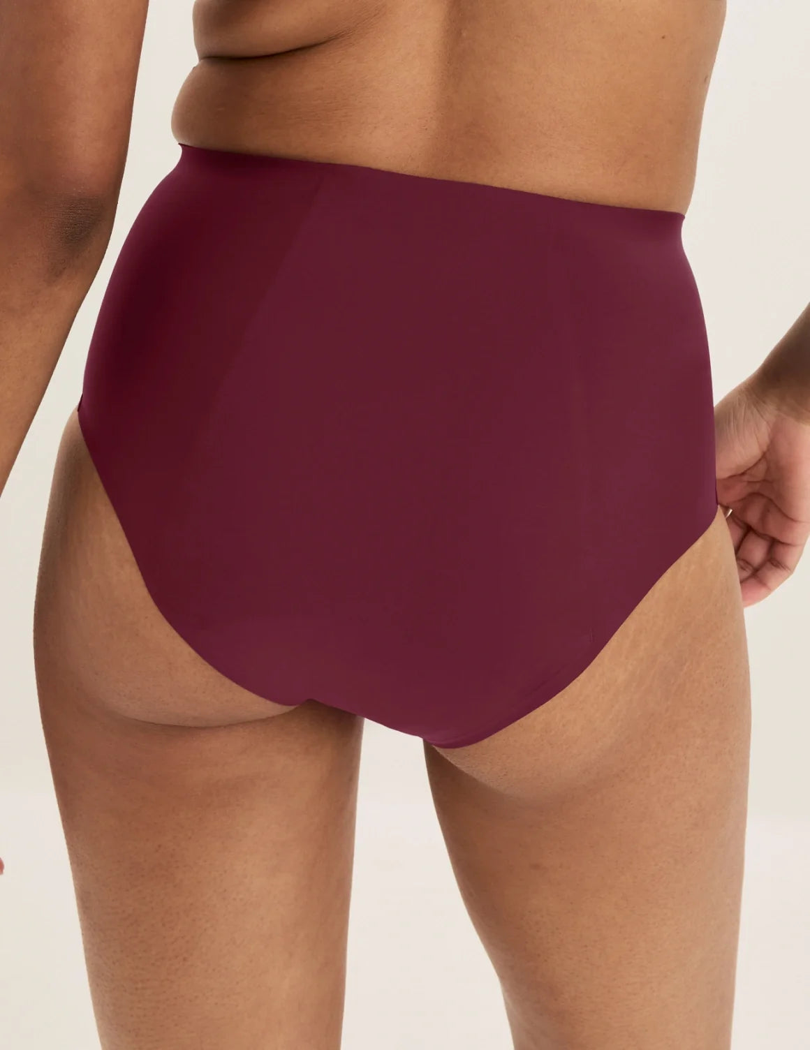 Back view of model wearing the SuperPlus Leakproof® No-Show High Rise highlighting the coverage and smooth fit – Dark Cherry – view 6 of 21