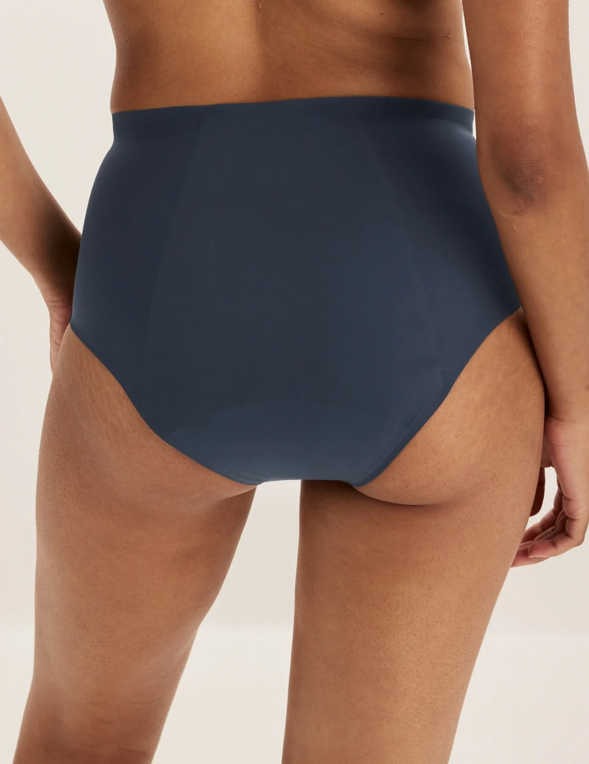 Back view of model wearing the SuperPlus Leakproof® No-Show High Rise highlighting the coverage and smooth fit – Twilight Navy – view 9 of 21